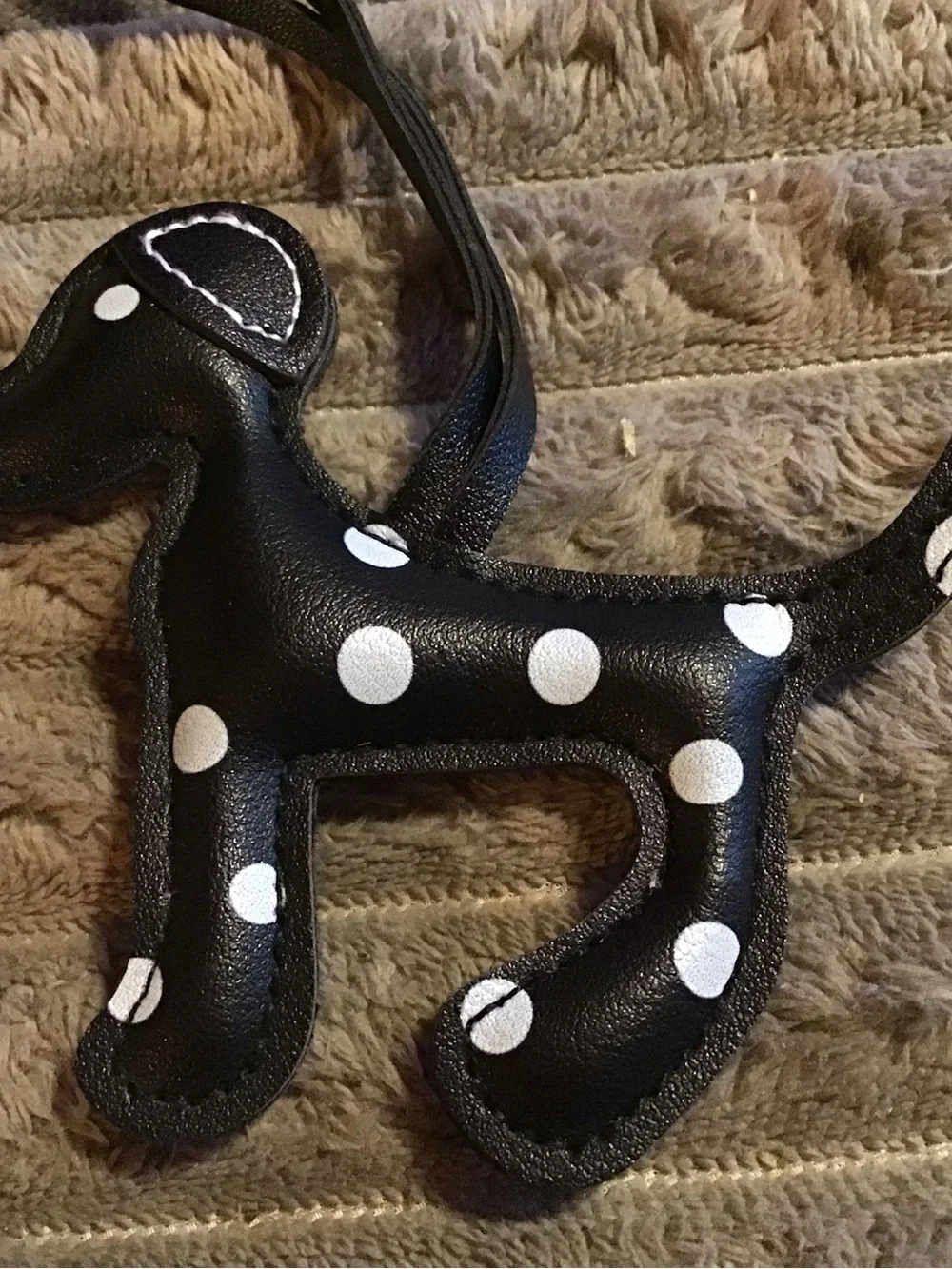 Black and white polka dot leather dog charm
